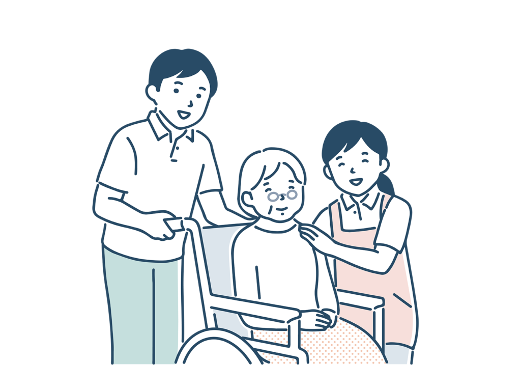 車椅子に座る高齢の女性と介護スタッフ
